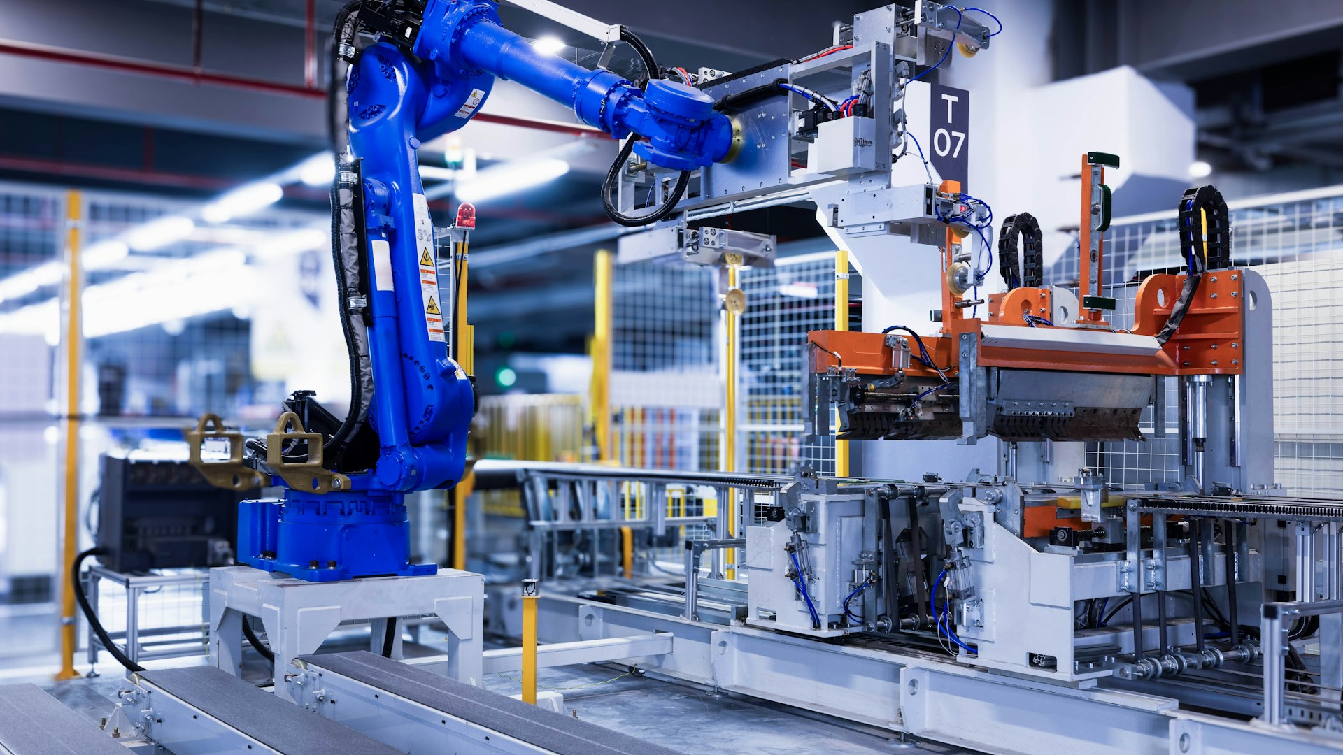 Robotic arm executing an automated workflow on a production line