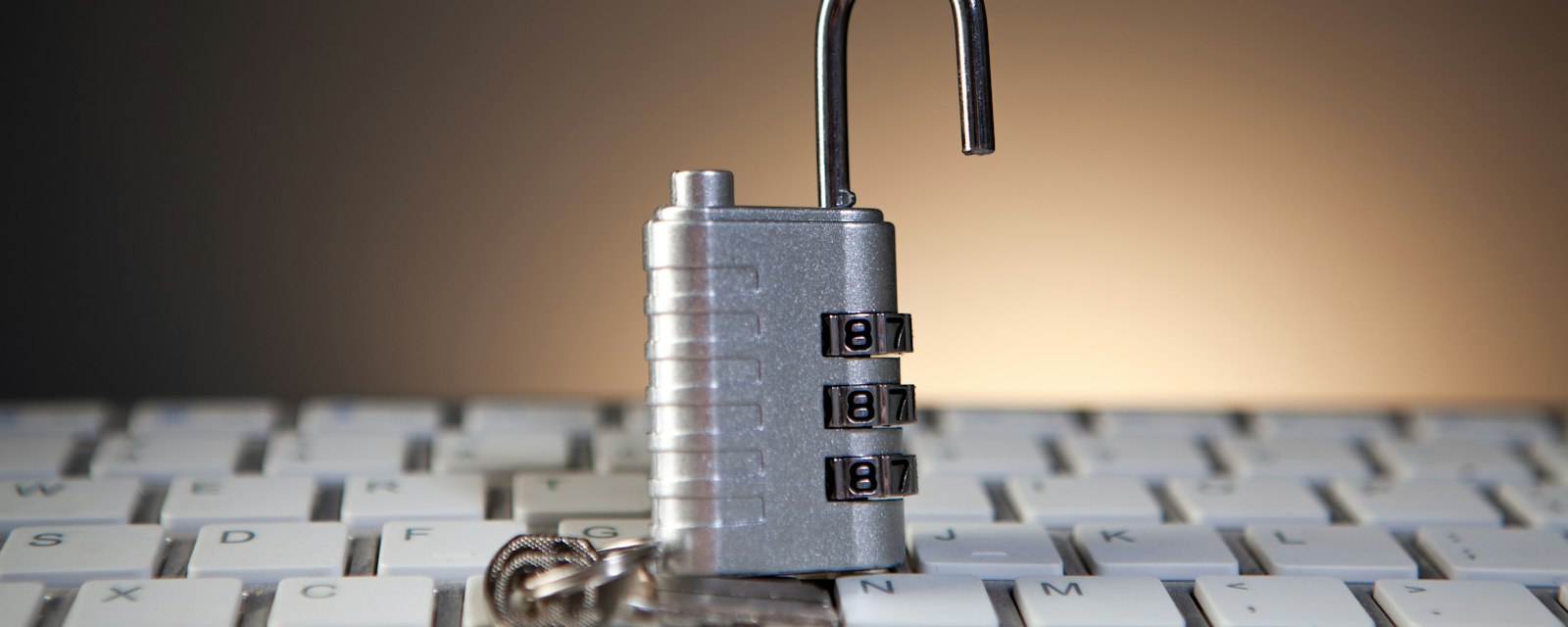 Padlock on a keyboard representing data security and governance